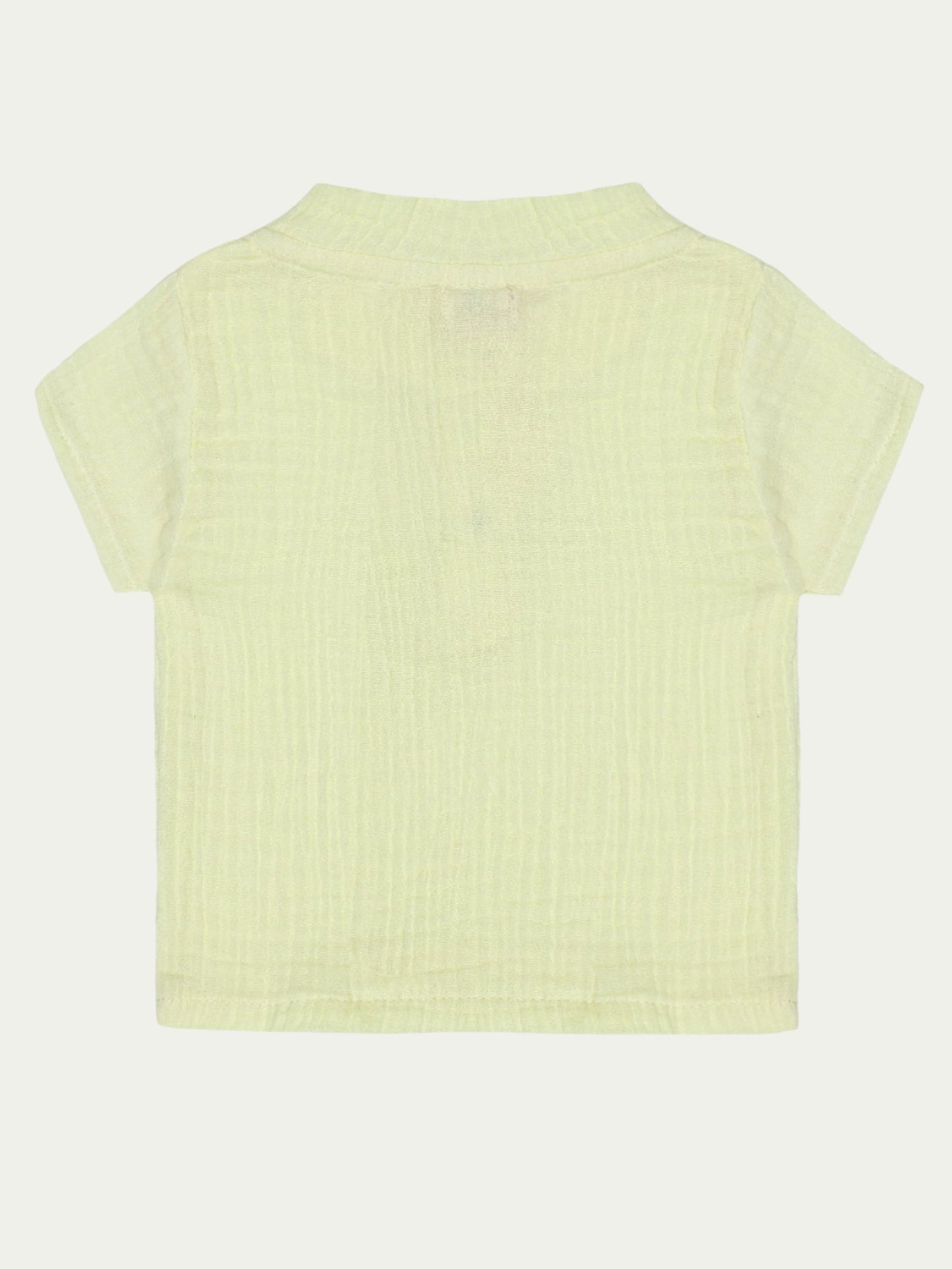 Back view of yellow organic cotton baby shirt with short sleeves – soft, breathable, and eco-friendly, perfect for babies aged 0-3 years by Ray&Baby.