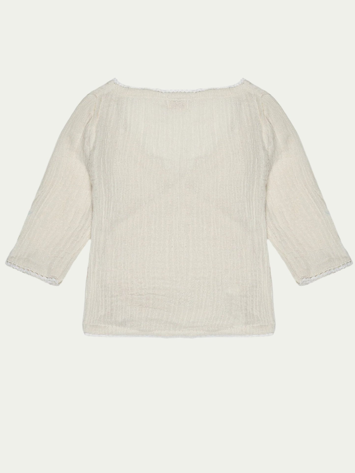 Back view of neutral beige organic cotton baby shirt with overlap style and lace lining – soft, breathable, and eco-friendly by Ray&Baby.