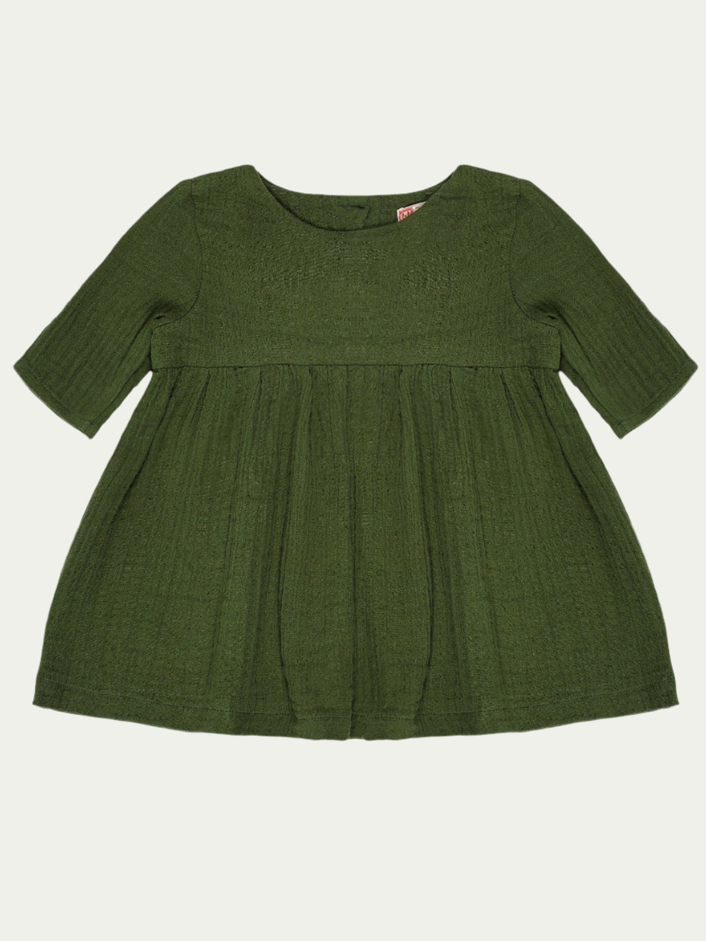 Forest green organic cotton baby dress with long sleeves and pleated design – eco-friendly and breathable, designed for babies aged 0-3 years by Ray&Baby.