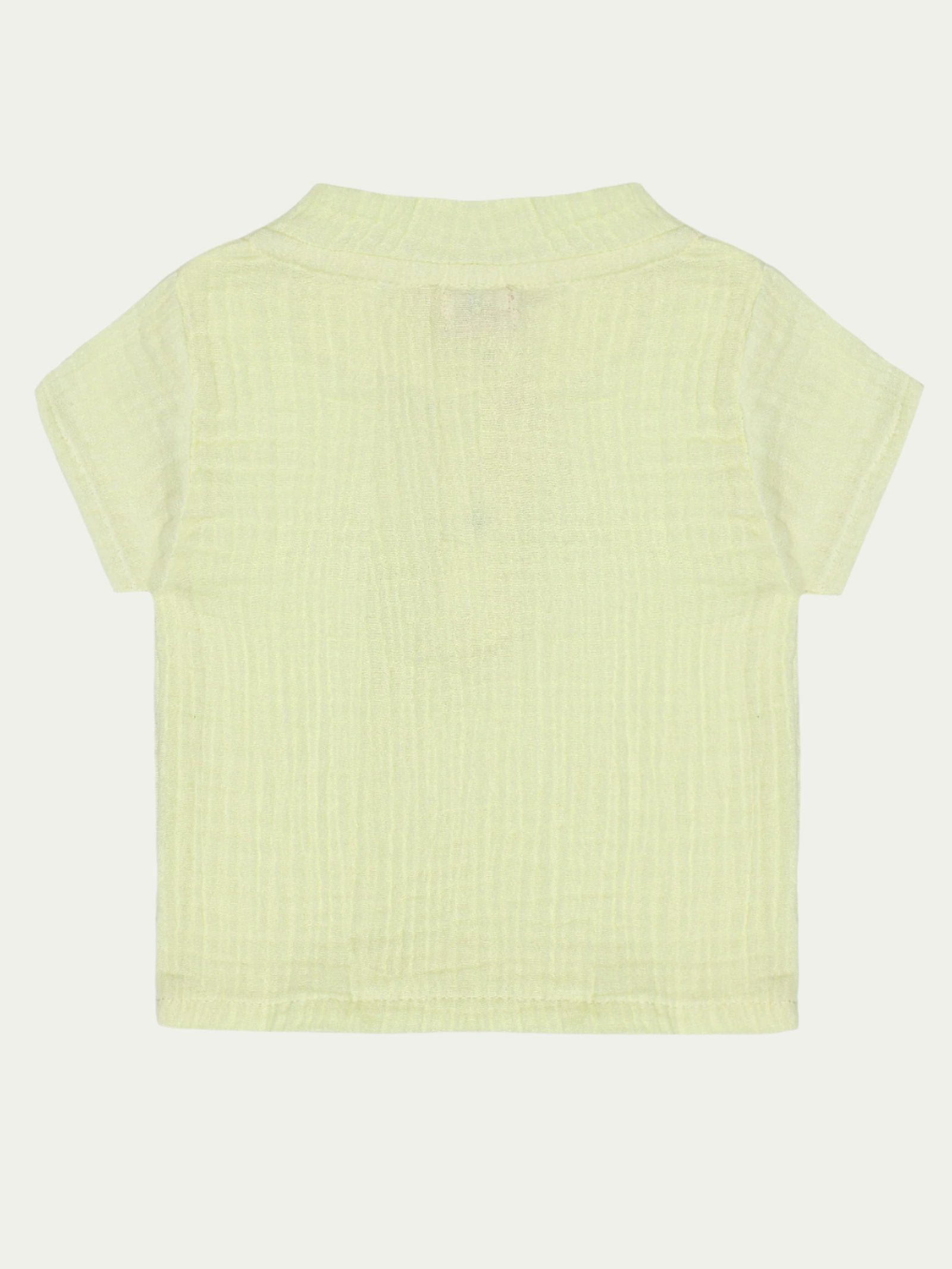 Back view of yellow organic cotton baby shirt with short sleeves – soft, breathable, and eco-friendly, perfect for babies aged 0-3 years by Ray&Baby.