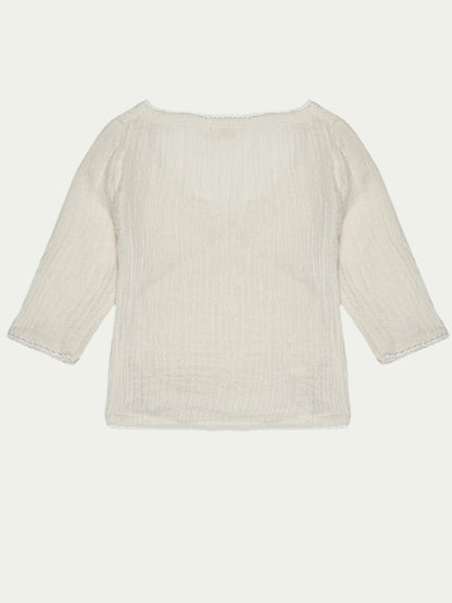 Back view of neutral beige organic cotton baby shirt with overlap style and lace lining – soft, breathable, and eco-friendly by Ray&Baby.