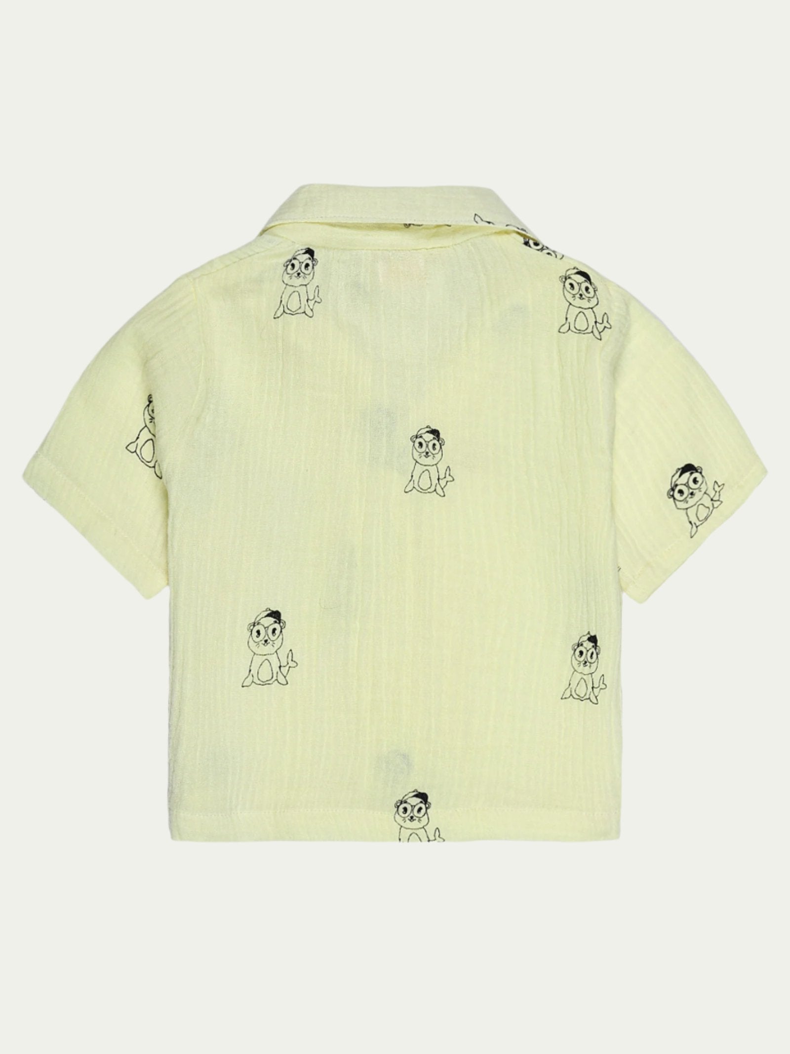 Back view of yellow organic cotton baby shirt with seal print – soft, breathable, and eco-friendly, perfect for babies aged 0-3 years by Ray&Baby.